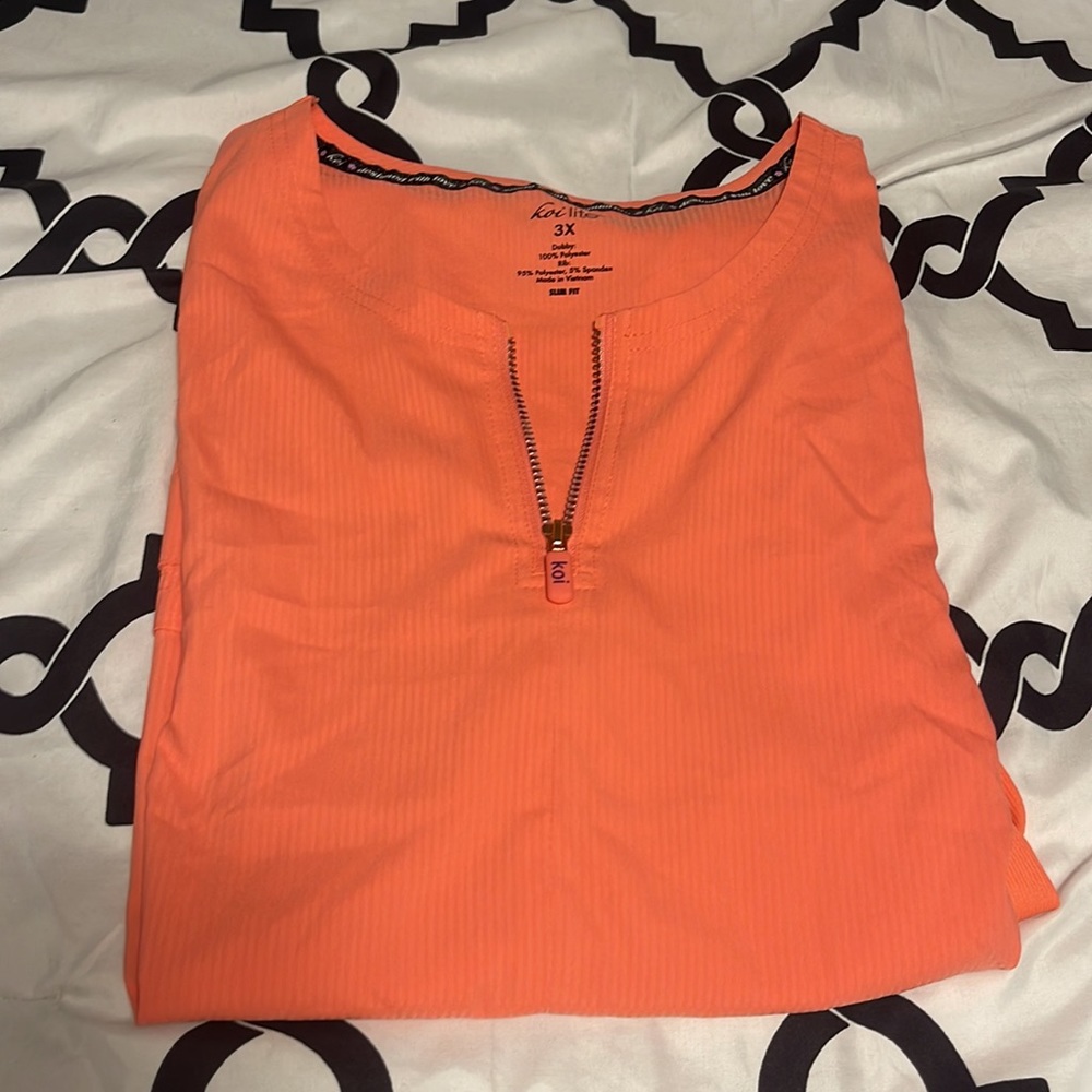 Woman’s Koi scrub top!